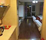 ห้องนอน 3 Dalian Aolai Hotel Apartment