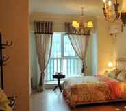 Bedroom 2 Dalian Xuanyi Selected Holiday Apartment
