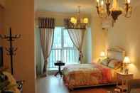 Bedroom Dalian Xuanyi Selected Holiday Apartment
