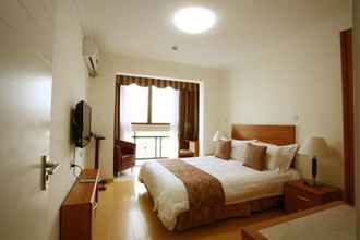 Bedroom 4 Dalian Xuanyi Selected Holiday Apartment