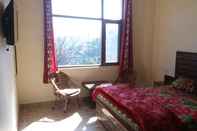 ห้องนอน Hotel Shimla View