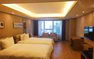 Bedroom 5 Herton Hotel Dalian