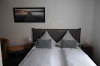 ห้องนอน Hotel & Gaestehaus Will