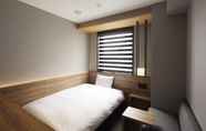 Kamar Tidur 4 hotel androoms Shin-Osaka