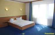 Bedroom 5 Sleep & Go Hotel Magdeburg