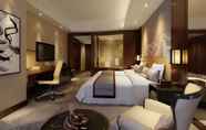 Bedroom 5 Grand New Century Hotel Fuyang