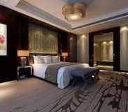 Bedroom 6 Grand New Century Hotel Fuyang