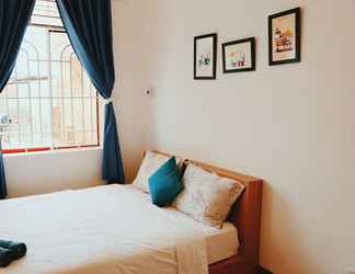 Kamar Tidur 2 QQ House with Balcony near Beach