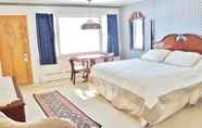 Phòng ngủ 3 Sara Placid Inn & Suites