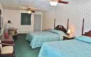 Phòng ngủ 7 Sara Placid Inn & Suites