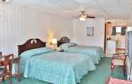 Phòng ngủ 4 Sara Placid Inn & Suites