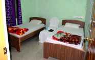 Kamar Tidur 6 Hotel Greenland Palace Bodhgaya