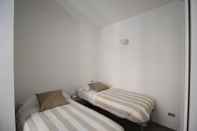 ห้องนอน Residence Piazza Trento 11