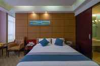 ห้องนอน Ming Yang Hotel