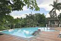 Kolam Renang Overlooking Lagoon at Sitio de Amor