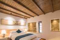 Kamar Tidur Anji Valley House Hotel