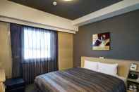 Bilik Tidur Hotel Route-Inn Utsunomiya Yuinomori -Lightline Yuinomori Nishi-