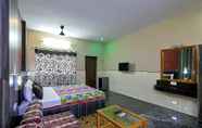 ห้องนอน 7 Vinodhara Guesthouse
