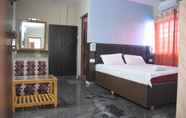 ห้องนอน 4 Vinodhara Guesthouse