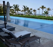 Swimming Pool 2 Condo Peninsula by LATAM Vacation Rentals