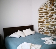 Bedroom 4 Effrosini Stonehouse Portaria