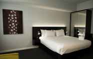 Kamar Tidur 4 The Gerald Apartment Hotel