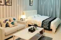 Phòng ngủ Yi Chao Hotel Apartment