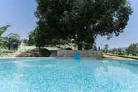 Swimming Pool Treebo Trend Laa Gardenia Resort With Mountain View