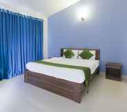 Bedroom 7 Treebo Trend Laa Gardenia Resort With Mountain View