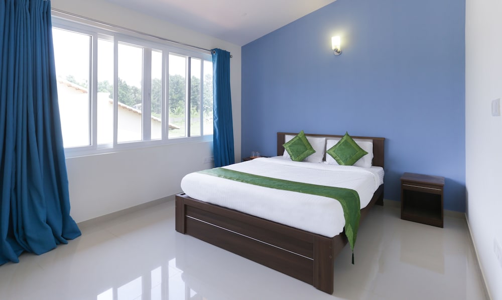 Bedroom 5 Treebo Trend Laa Gardenia Resort With Mountain View