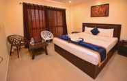 ห้องนอน 4 La Macaw Resort