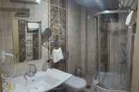 Phòng tắm bên trong Dedeoglu Otel