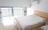Bedroom 6 Yunzu Aparthotel - Huanlegu Branch
