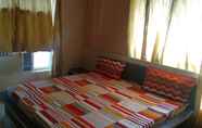 Kamar Tidur 7 Janardan Home stay Cozy Rooms Puri