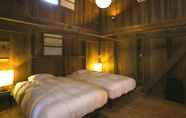 Bedroom 2 NIPPONIA Fukusumi Post Town Hotel