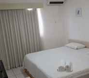 Phòng ngủ 4 Flat Bellagio Ferreira Hospedagens