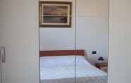 Kamar Tidur 3 B&B Al Calypso