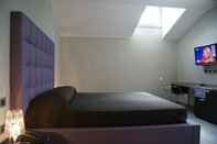 Kamar Tidur Blue Hotel