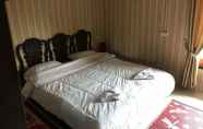 Kamar Tidur 2 Pukyo Bed and Breakfast