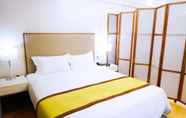 Kamar Tidur 6 Yujia Service Apartment Hebao Road