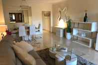 Lobby Casares Beach Golf Apartment With Private Garden and Pool Access