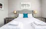 Kamar Tidur 6 Elegant Shepherds Bush Home by Kensington Olympia