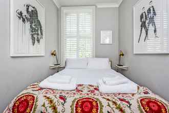 Kamar Tidur 4 Elegant Shepherds Bush Home by Kensington Olympia