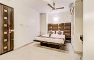 Kamar Tidur 3 FabHotel Capital Residency Brigade Rd