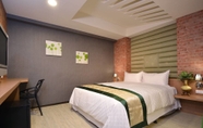 Kamar Tidur 3 Ching She Hotel