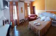 Kamar Tidur 4 Hostal Los Arcos