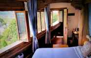 Kamar Tidur 4 Colorful Mountain Boutique Inn