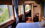 Kamar Tidur 4 Colorful Mountain Boutique Inn