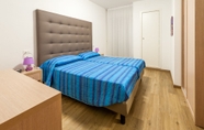 Kamar Tidur 7 Hotel Garni Losanna