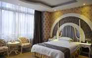 Kamar Tidur 4 Panda Cub Hotel 1227 Branch